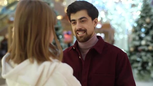 Closeup View From Back of Unrecognizable Little Girl to Caring Father Standing on Knee and Talking
