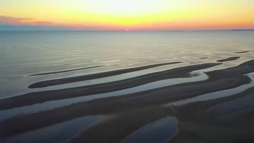 Cape Cod Bay Colorful Sun Set Aerial Reveal Drone Footage of Beach at Low Tide with People Walking,
