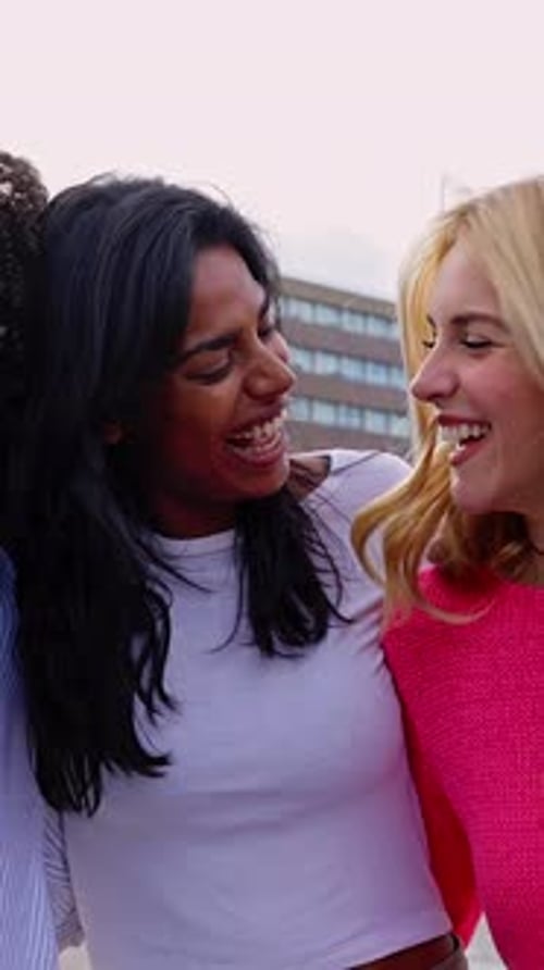 Vertical Video Young Women Friends Laughing Together at City Street