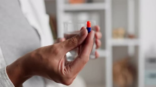 The Girl Took The Pills. Taking Pills Taking Medical Drugs Capsule Pills Drugs. Close Up Hand Holds