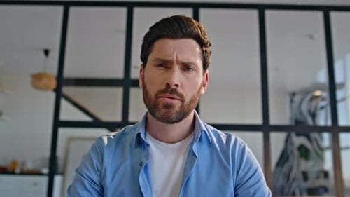 Man Saying No with Crossed Arms in an Office