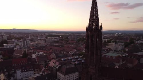 Freiburg Cathedral aerial shot circular panorama around holding on rule of thirds
