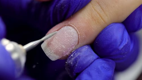manicure done by a professional manicurist in slow motion