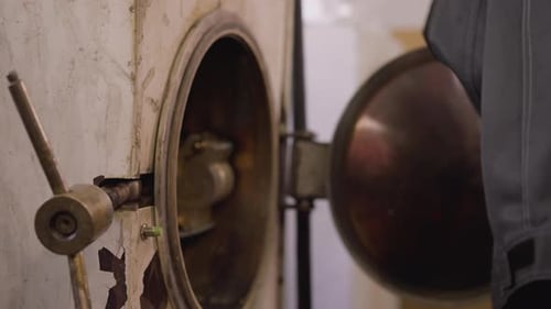 Kiln Door Operation in Ceramic Workshop