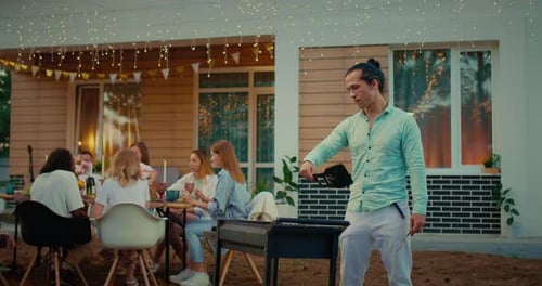 Friends Gather for Backyard Barbecue Party