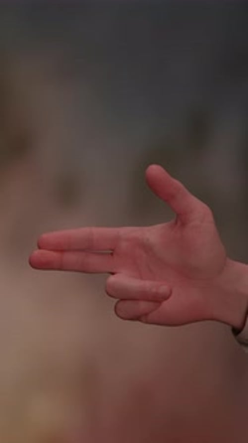 Hand in Finger Gun Position