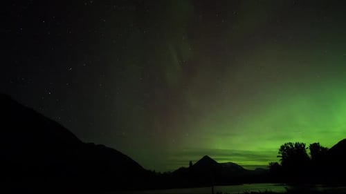 Spectacular Starscape Time lapse with Northern lights, aurora borealis display viewed near Mount Bon
