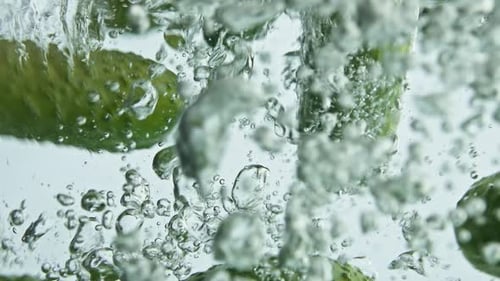 Cucumbers Splashing into Water