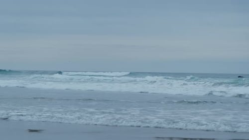 Wide Footage of Beach in Coastal Town Cannon Beach Oregon