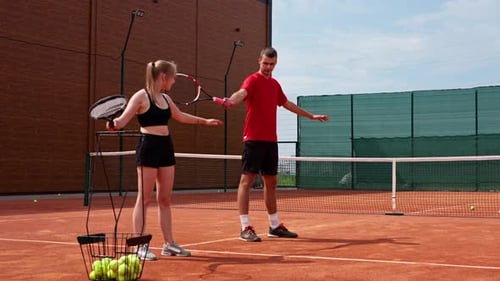 Tennis Lesson on an Outdoor Clay Court