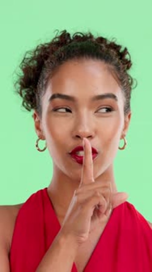 Woman, face and finger with hush, silence and mystery announcement on green screen