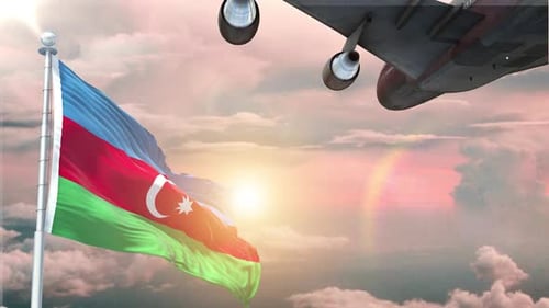 Azerbaijan Flag Waving with Airplane Flying Across Sunset Sky