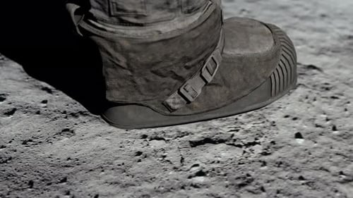 Astronaut Boot Steps on Moon Leaving Footprint