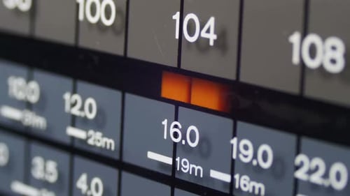 Tuning Radio Dial Frequency on Scale of the Vintage Receiver
