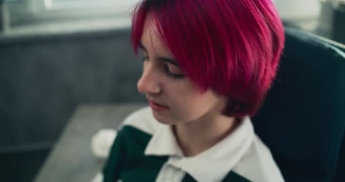 Close Up of Upset Caucasian Teenage Girl Sharing Feelings During Therapy