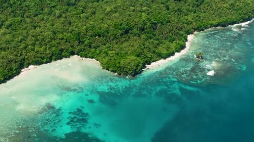 Beach and Ocean Waves on Coastline of Samal Island Davao Philippines