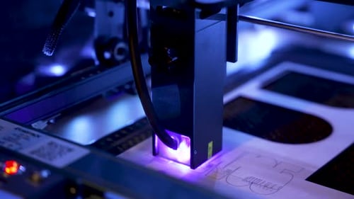 Close up laser engraver cutting wood material