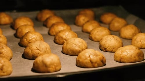 Round homemade cookies are baked in the oven