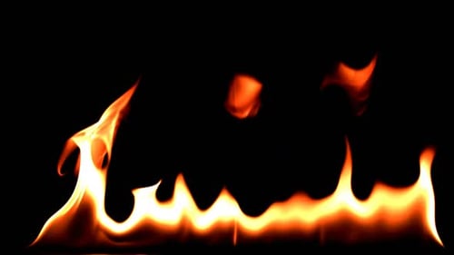 Intense fiery flames on black background loop