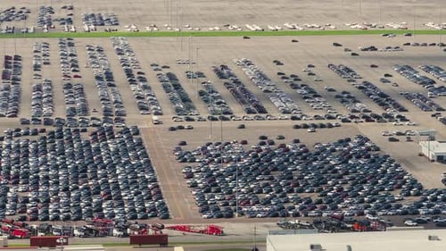 New Cars Parked on Automotive Factory Parking Lot for Worldwide Export Dealer Vehicle Inventory
