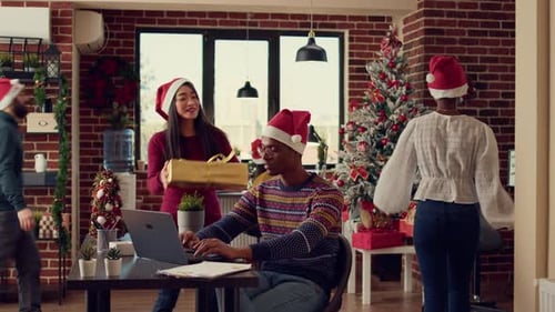 Diverse People Exchanging Gifts at Office Job