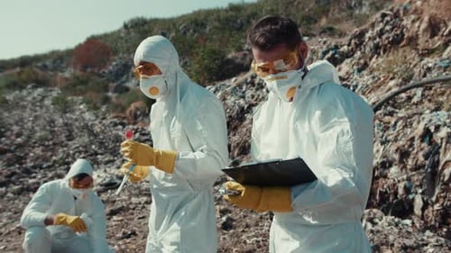 Dedicated Scientists Engage in Rigorous Field Research While Donning Protective Gear for Safety