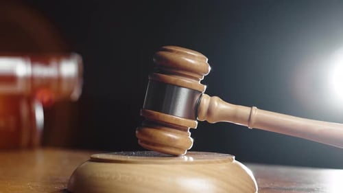 Wooden Gavel Resting on a Table