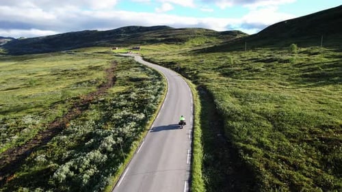 Motorcyclist on mountain roads norway