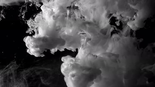 White Ink Swirls on a Black Background