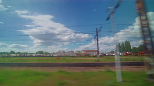 View From the Window of High Speed Train Beautiful Trip with Countryside Scenery Clouds A View of