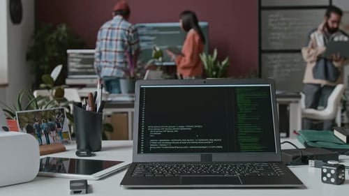 Timelapse of Laptop with Running Lines of Computer Code at IT Company