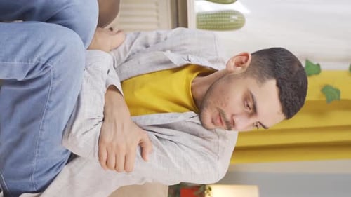 Vertical video of Nervous man stressed and thoughtful.