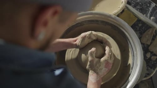 Ceramist's Journey on the Pottery Wheel Embarking on the Artistic Craft of Clay