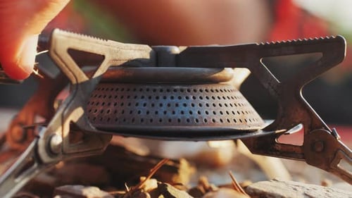 Camping Stove Close Up on Rocks