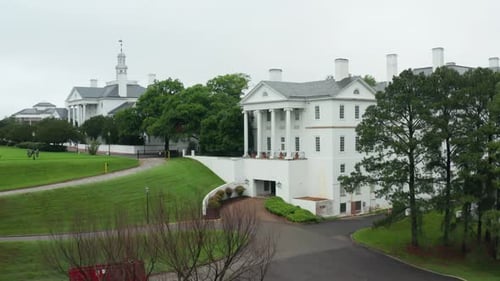 Confederate White House in Richmond Virginia. Rising aerial in VA. City downtown skyline.