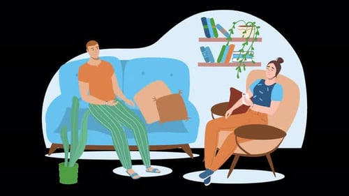 Conversation décontractée entre deux personnes dans un salon confortable.