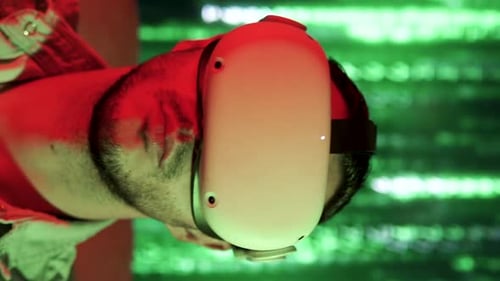 Rotating Portrait of Man with Vr Glass in Metaverse Virtual Reality Green and Red Lights