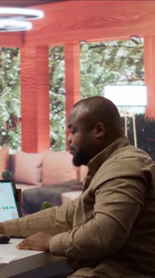 Vertical Video Entrepreneur Falling Asleep While He is Calculating the Annual Sales Reports