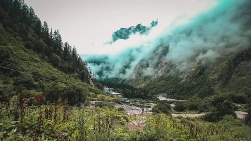 Time lapse footage of clouds moving over a himalayan village