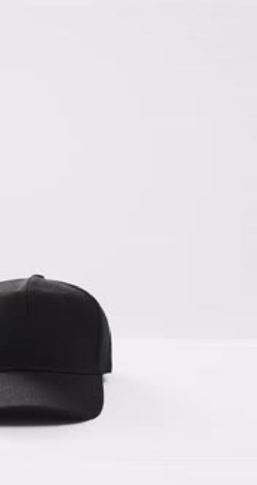Isolated Black Baseball Cap on White Background
