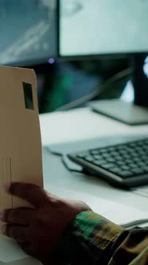 Vertical Video Military Personnel Operating in a Secure Office Environment