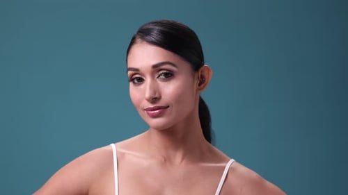 Beautiful Woman Smiling in a Studio Close Up