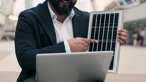Man in Suit Explains Solar Panel Technology