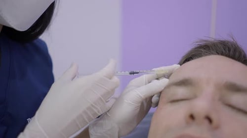 Man Gets Skincare Treatment for Expression Lines and Wrinkles in Thai Beauty Salon