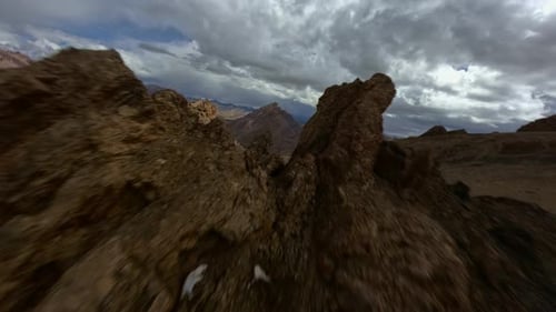 Rocky Ridges in the Tibetan Mountains View From an FPV Drone
