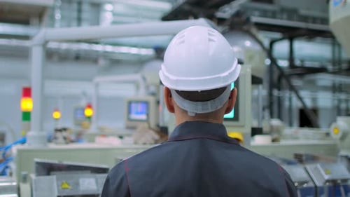Worker Engineer Man at Engineer Industrial Factory Production Plant Factory