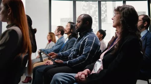 Black Male Attend Professional Business Event in Conference Hall