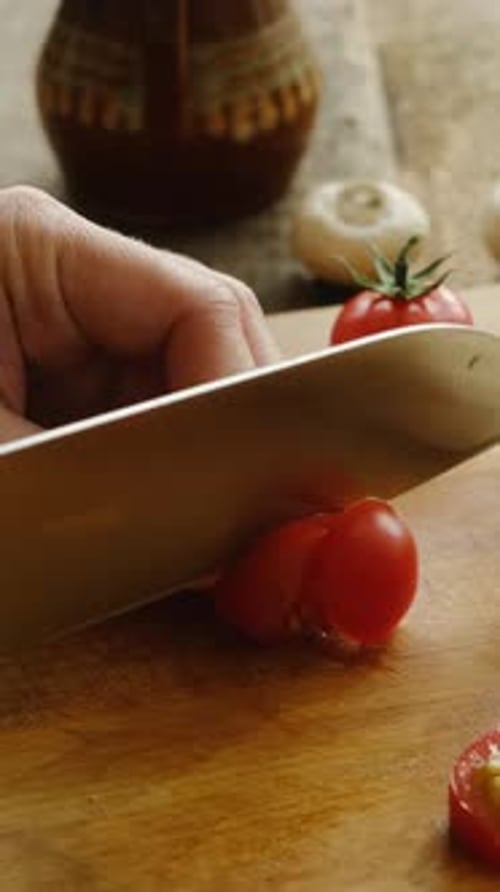 Slicing Tomatoes on Wooden Cutting Board