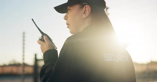 Security guard, radio and woman on patrol outdoor for inspection, investigation and property search