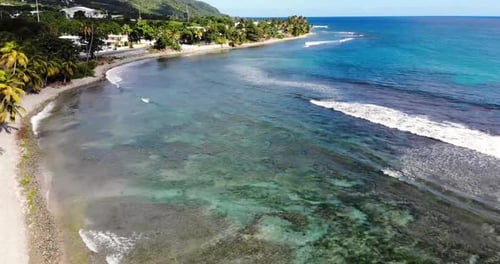 Drone footage while flying over a beach in the southeast part of Puerto Rico.
